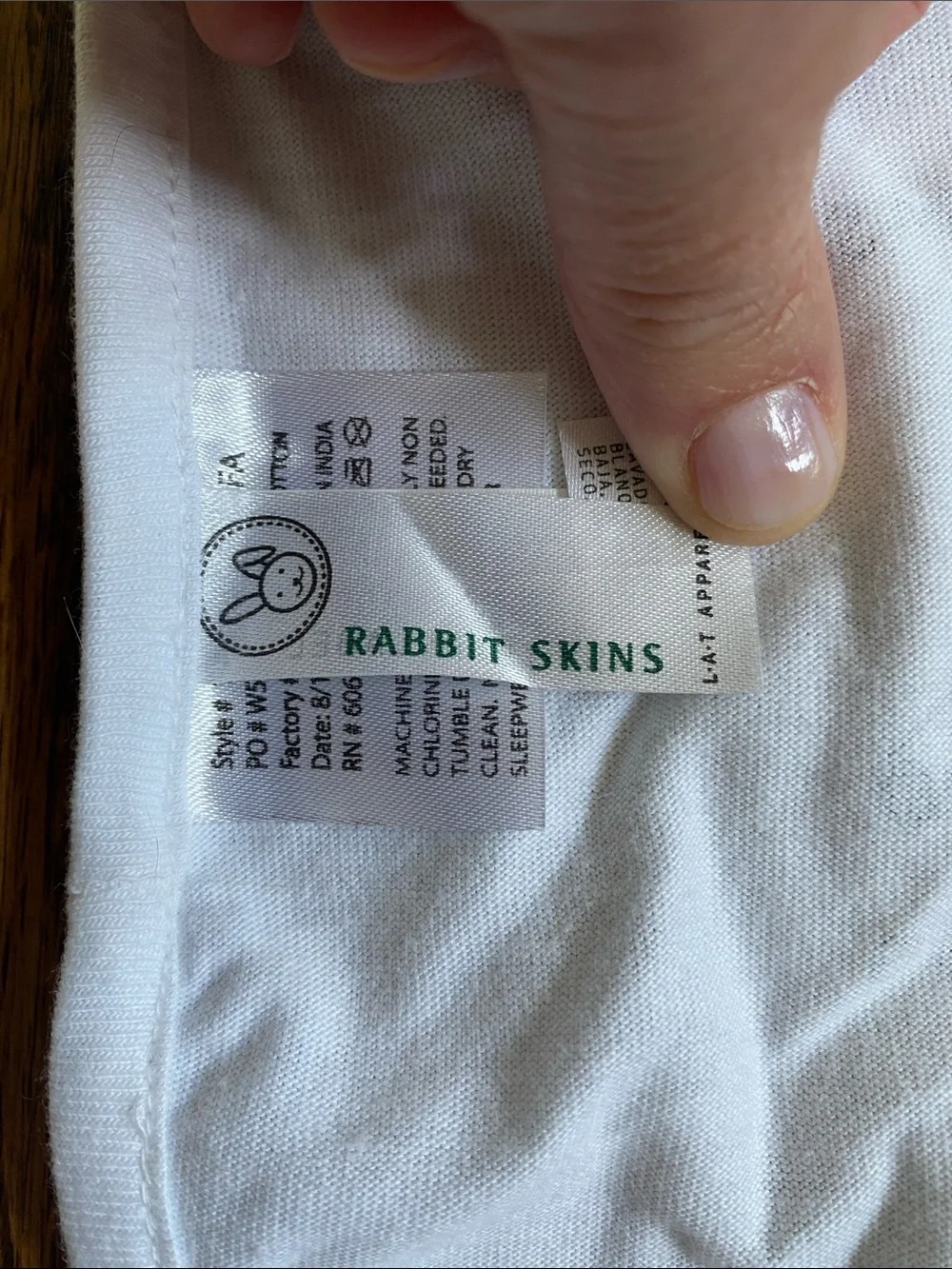 Rabbit Skins White Baby Bib with 'Patriarchy Smasher' Hammer Graphic, like new.